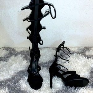 Over the knee strappy heels